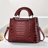 Chic crocodile pattern women’s shoulder bag with adjustable strap and zipper closure. Stylish crossbody purse perfect for casual or formal occasions.