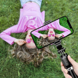 40" retractable selfie stick tripod with wireless remote and 360° rotation. Stable anti-shake design ideal for travel, vlogs, live streaming, iPhone & Android.