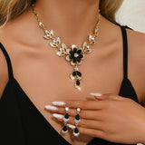 Black & Gold Flower Jewelry Set — Necklace & Earrings