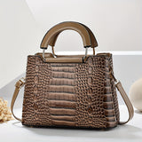 Chic crocodile pattern women’s shoulder bag with adjustable strap and zipper closure. Stylish crossbody purse perfect for casual or formal occasions.